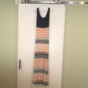 Navy open back dress with gray and peach stripes